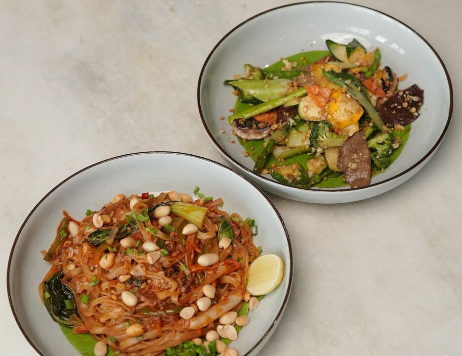Shared table with salad and curry bowls at Nouba Restaurant and Rooftop Lounge, C-Scheme Jaipur