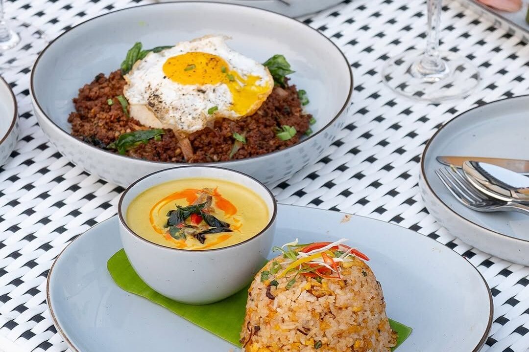 Rice bowl topped with a fried egg at Nouba Restaurant and Rooftop Lounge, C-Scheme Jaipur