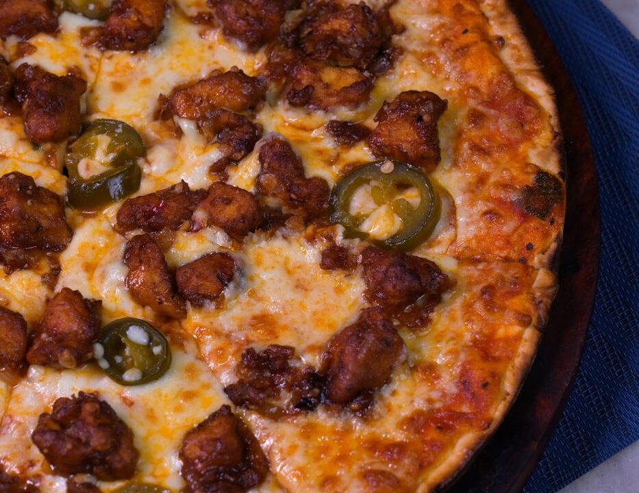 Wood fired pizza with jalapeno at Nouba Restaurant and Rooftop Lounge, C-Scheme Jaipur