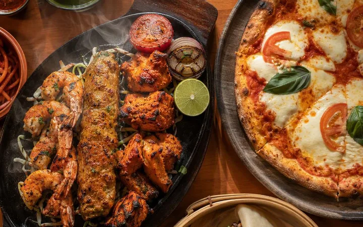 North Indian Restaurants Near Me: Pair Kebab Platters with Pizza and Asian Starters