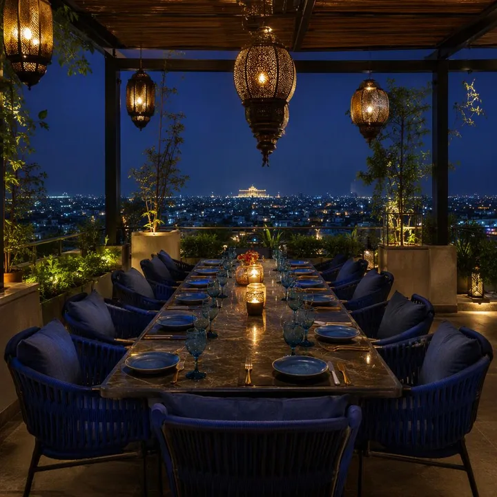 Rooftop table setup with skyline view at night at Nouba Restaurant and Rooftop Lounge, C-Scheme Jaipur