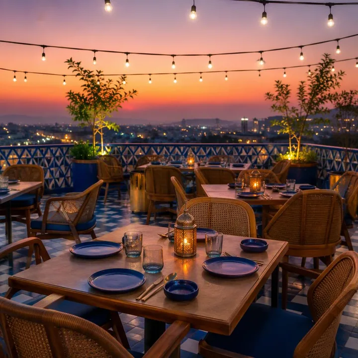 Rooftop table setup with Jaipur skyline view at Nouba Restaurant and Rooftop Lounge, C-Scheme Jaipur