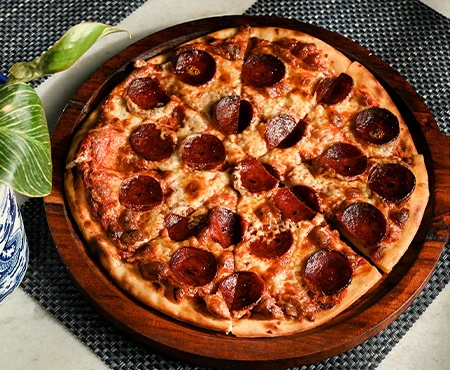 traditional Neapolitan-method wood-fired pizza at Nouba Restaurant Jaipur