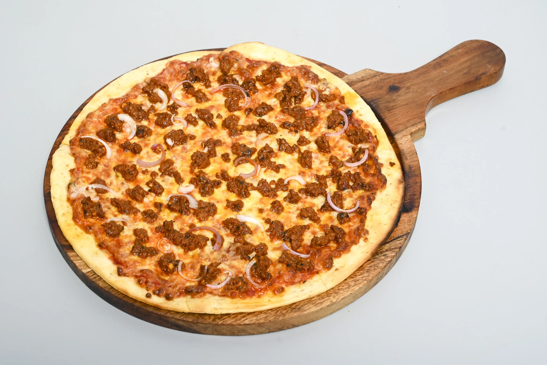 Wood-fired Neapolitan pizza with fresh mozzarella and basil