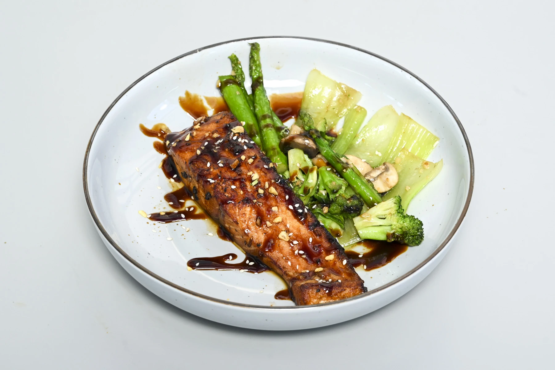 Pan-seared teriyaki salmon with asparagus and citrus glaze