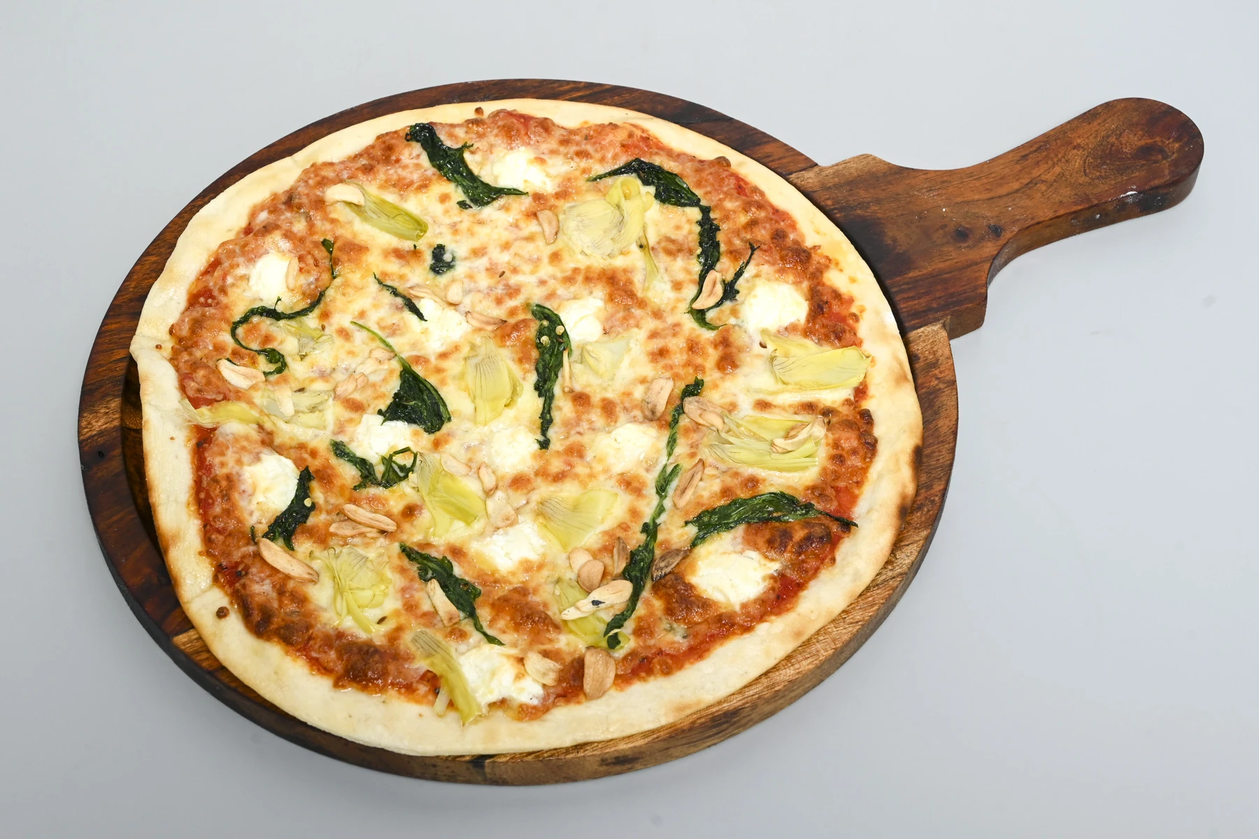 Spinach and artichoke pizza at Nouba